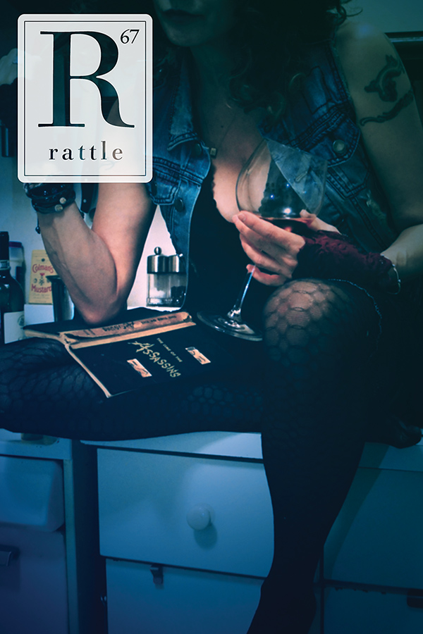 Rattle #67 cover, dark photo of woman sitting on kitchen counter with wine glass